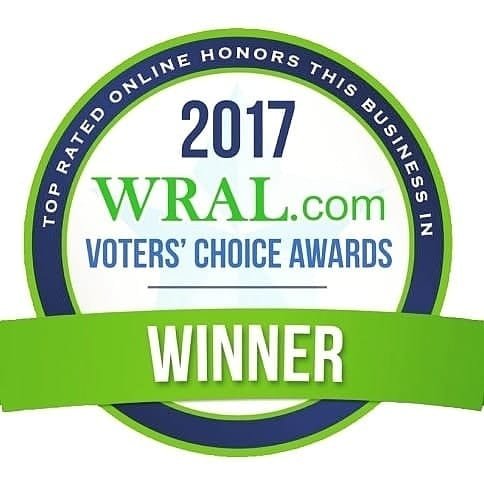 2017-wral-voters-choice - Alexander Services - Alexander Services Circular award badge announcing 2017 wral. Com voters' choice awards, with a green ribbon reading 'winner' across the bottom.